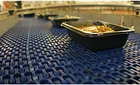 Conveyor with food packages