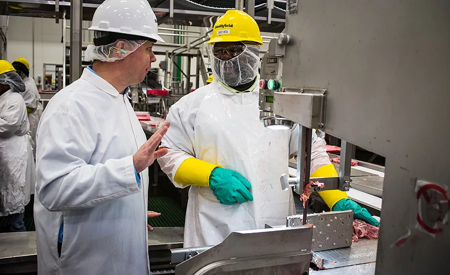 Andy Hanacek and Smithfield employee Derrick Hinton