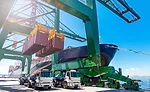 Shipping Crates Being Loaded on Ship for Export
