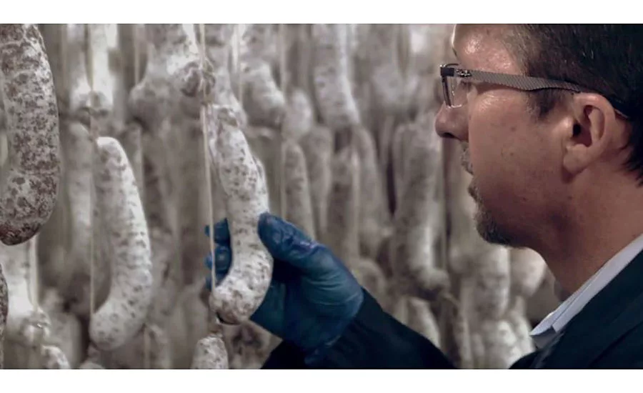 Columbus Craft Meats Employee Checks Curing Meats