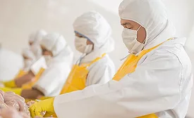 Meat Plant Workers Wearing Food Safety Apparel