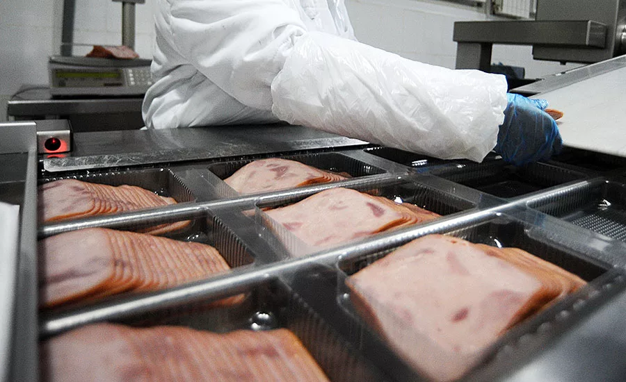 Meat Plant Employee Wearing Food Safety Glove and Sleeve
