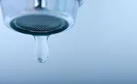 Drop of Water Out of Faucet