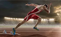 A Runner Taking Off From Starting Blocks