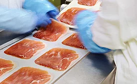 Employees Inspecting Meat