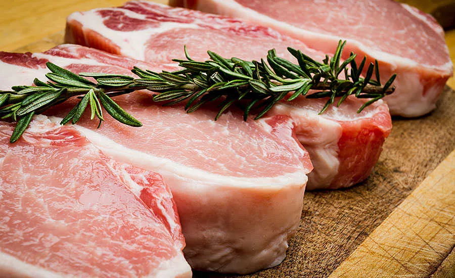Thick Cuts of Steaks Topped With Herb