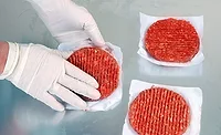 Interleaving Pre-cut Sheets Under Patties