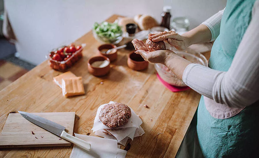 Woman Prepping Burger Patties