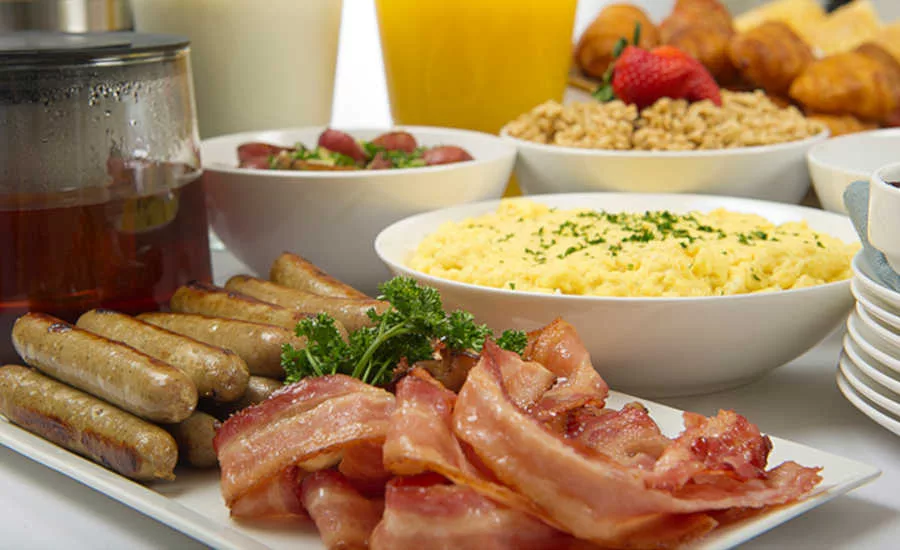 Sausage Links, Bacon, and Eggs on Table