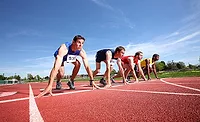 Track Runners at Starting Line