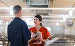 Woman Holding Piglet