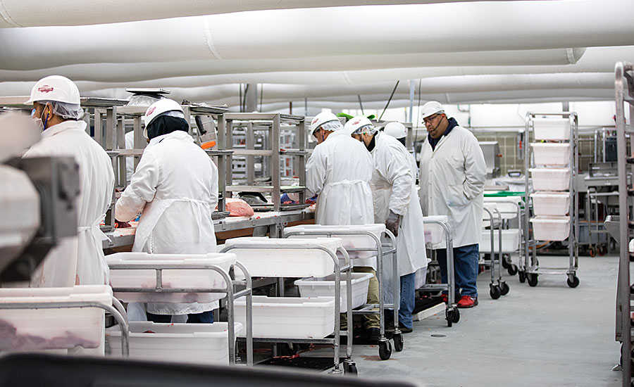 Omaha Steaks employees at the Main Production Plant