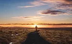 Person Hiking in the Sunset