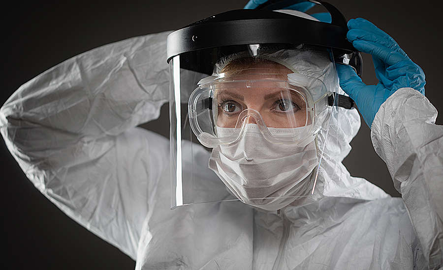 woman in PPE