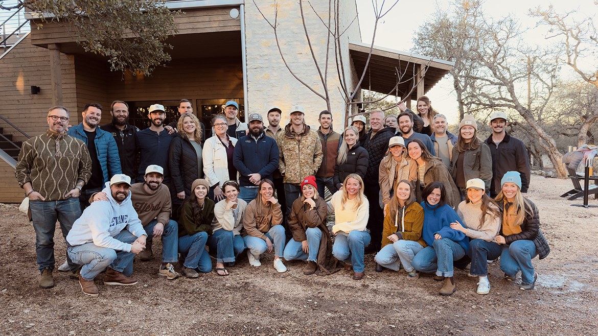 Force of Nature Meats team poses in a large group outside.
