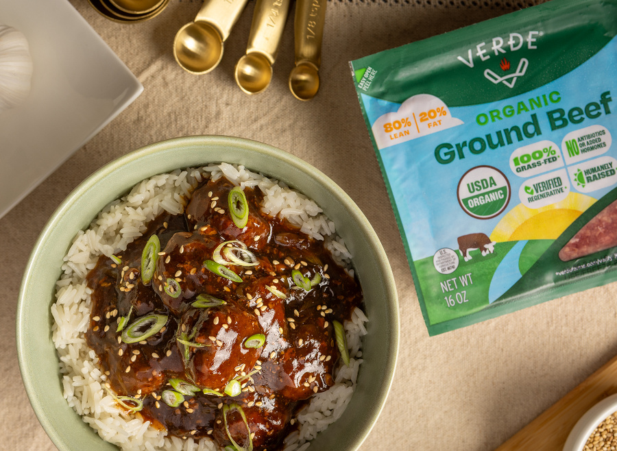 Cooked ground beef on rice in a bowl and a package of Verde Farms 80-20 Ground Beef.