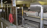 High-pressure Processing Equipment Products are loaded into cylinders prior to being put into the high-pressure processing equipment