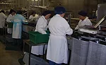 Michael Angelo's utilizes automation wherever possible, but some products still require hand-layering by employees
