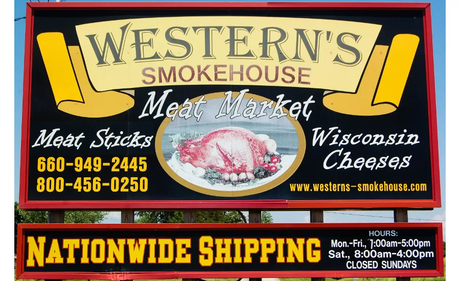 Western’s Smokehouse exterior sign promotes it meat sticks and Wisconsin cheeses