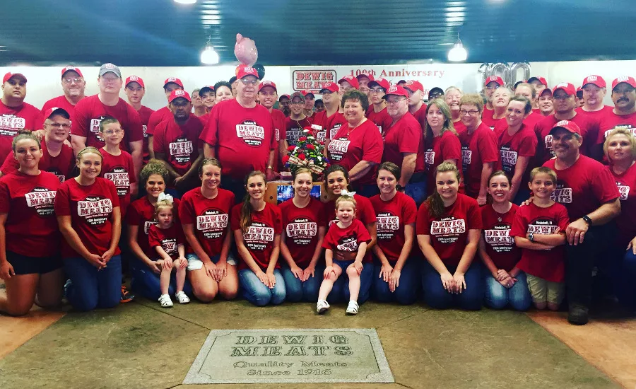 Dewig Meats employees celebrate its 100th anniversary