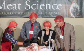 Ceremonial salting of hams at the University of Wisconsin-Madison