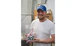 Jason Ainslie Holds A Whole Rabbit Fryer