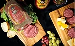 Seltzer's Bologna Served with Cheese and Grapes