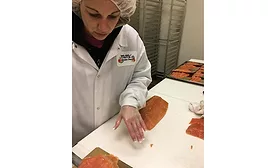 Shuckman's Employee Hand-Slices Fish