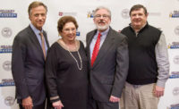 Tennessee Governor Bill Haslam, with Williams Sausage founder Hazel Williams and her sons, owners Roger and David Williams