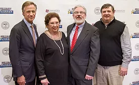 Tennessee Governor Bill Haslam, with Williams Sausage founder Hazel Williams and her sons, owners Roger and David Williams