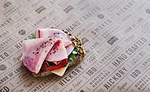 Frick's Ham Sandwich Sitting on Frick's Parchment Paper