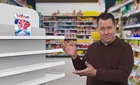 Andy Hanacek Pointing to Fake Meat Tabloid